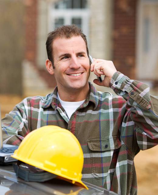 Series at a new home construction site.  Includes construction worker/builder, real estate agents and young Caucasian couple